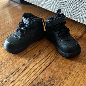 Black high top Nike Air Force